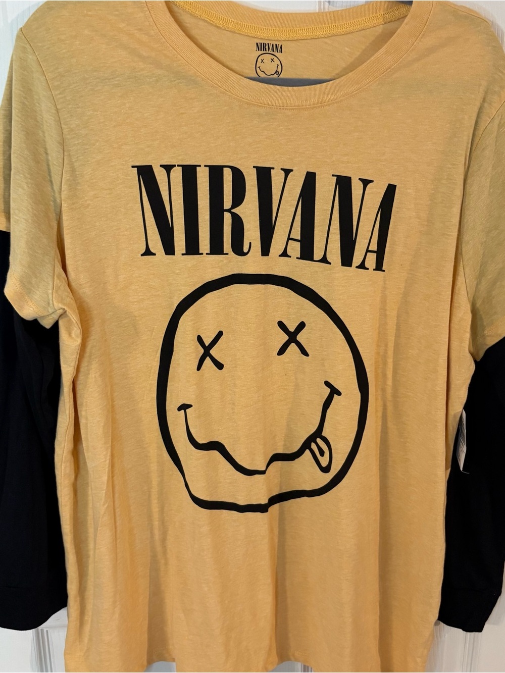 Nirvana Yellow & Black Long-Sleeve Smiley Logo Tee from Torrid Plus Curve